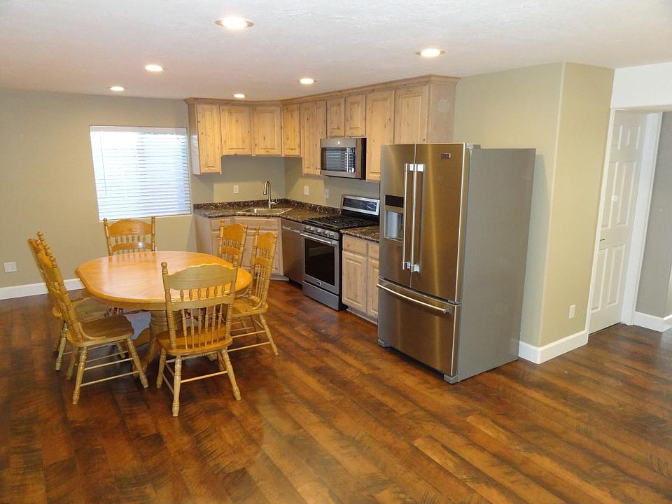 Kitchen with bathroom door