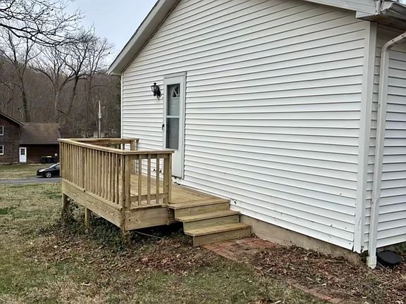 Side deck with convenient kitchen entrance.