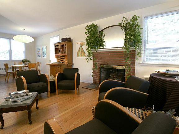 Living Room / Dining Room w Wood-burning Fireplace