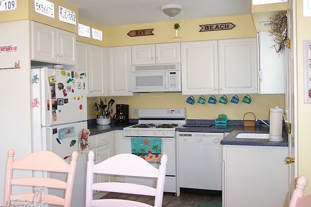 1st Level Kitchen- Corian Counters, Dishwasher, Microwave, Self-Cleaning Oven