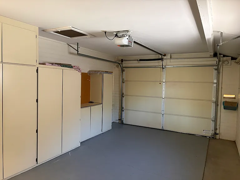 Main Garage with Storage Shelves