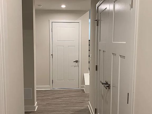Ground Floor Hallway adjoining front door and garage door.