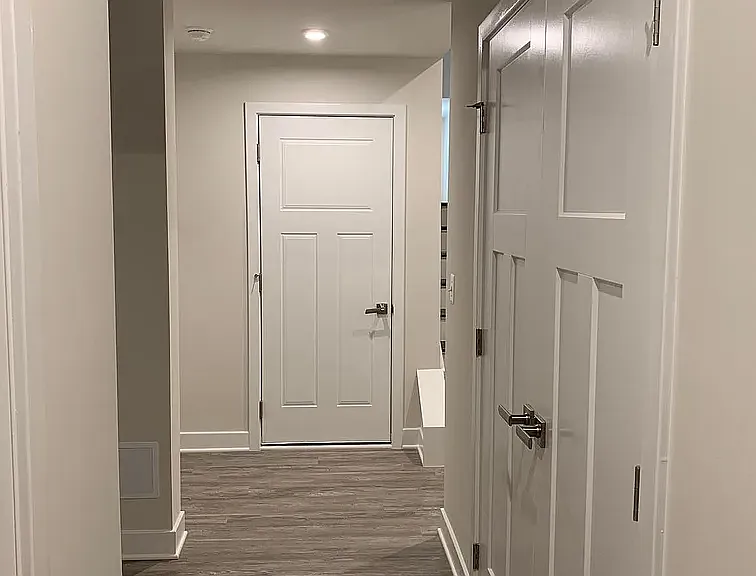 Ground Floor Hallway adjoining front door and garage door.