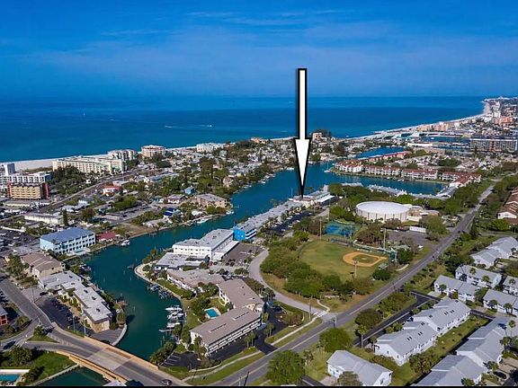 On a canal and a short walk or drive to the beautiful and wide beach.