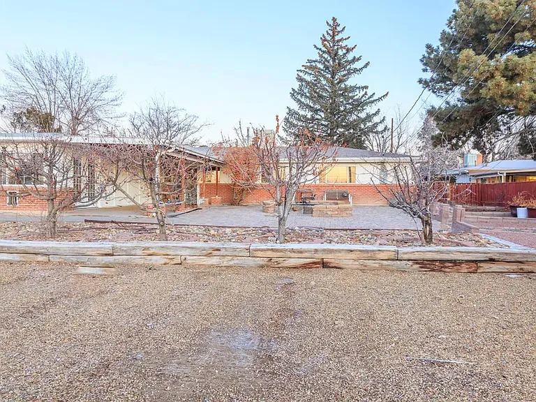 Huge backyard, landscaped for relaxation and entertaining. Enjoy evenings around the built-in fire pit, gather with friends in the multiple seating areas, or grow your favorite flowers and vegetables in the two dedicated gardening spaces.