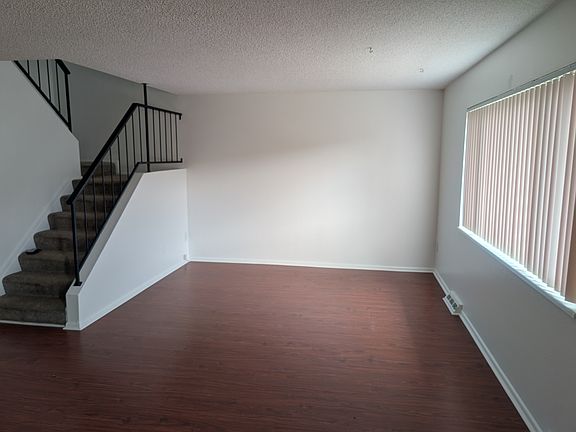 Living Room - Stairs to upper floor