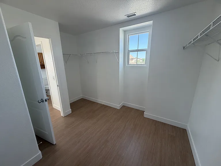 HUGE WALK-IN CLOSET FOR PRIMARY BEDROOM