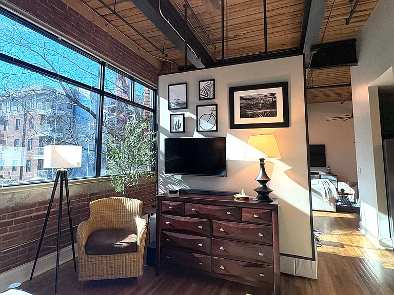 Bedroom includes a smart TV with Bose soundbar and subwoofer