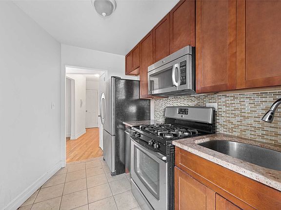 4th image of 65-50 Wetherole St. #6L