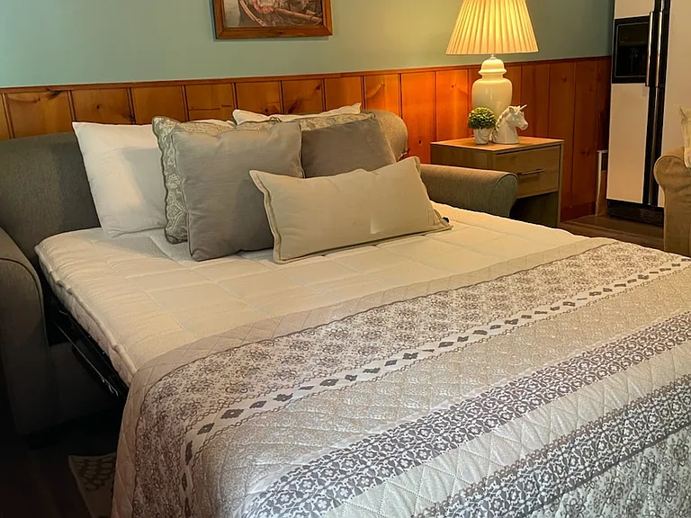 QUEEN PULLOUT COUCH -
 FOAM-GEL MATTRESS
