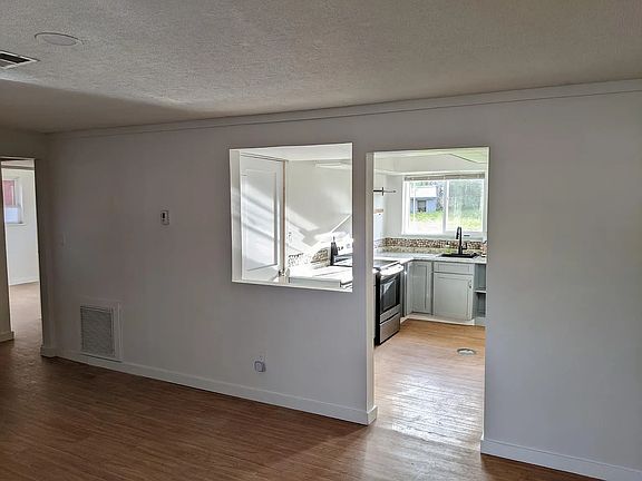 Living room view towards kitchen