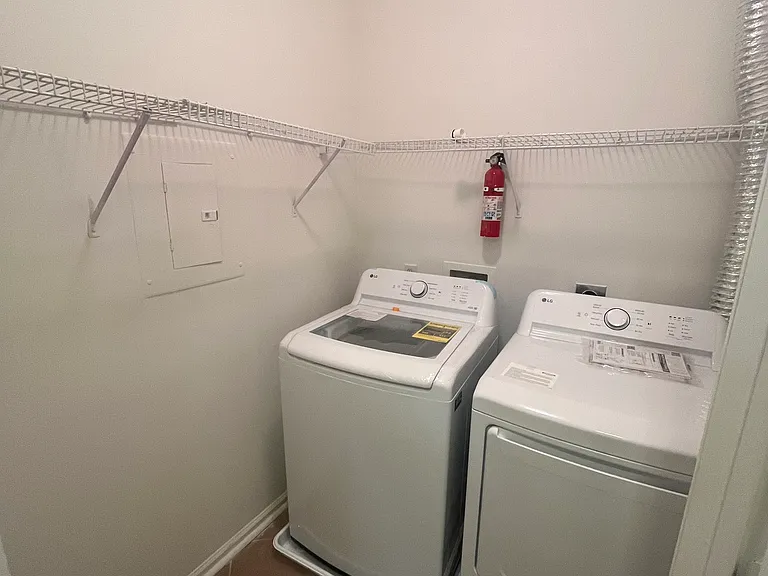 Huge In-Unit Laundry Room with lots of storage space