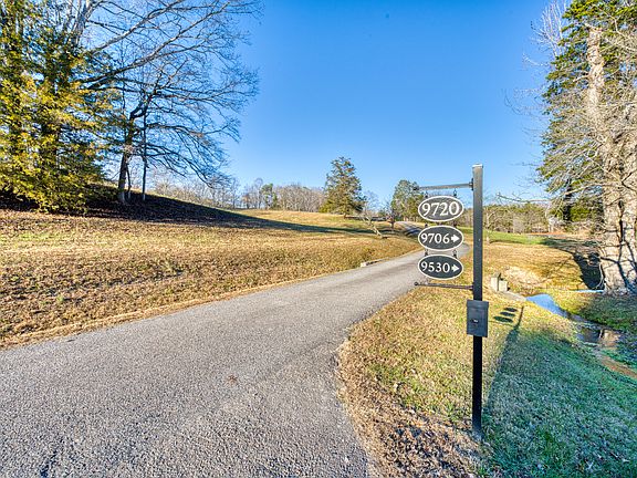 A private paved lane through a bucolic drive, stroll, jog, or bike ride home.