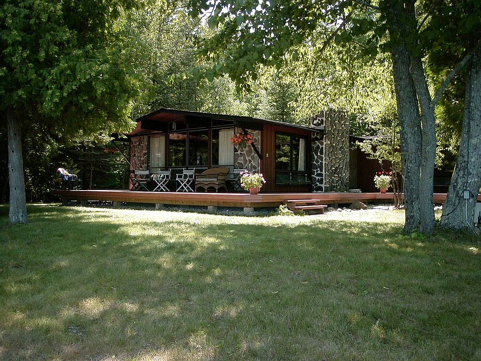1st image of 6385 N West Torch Lake Dr