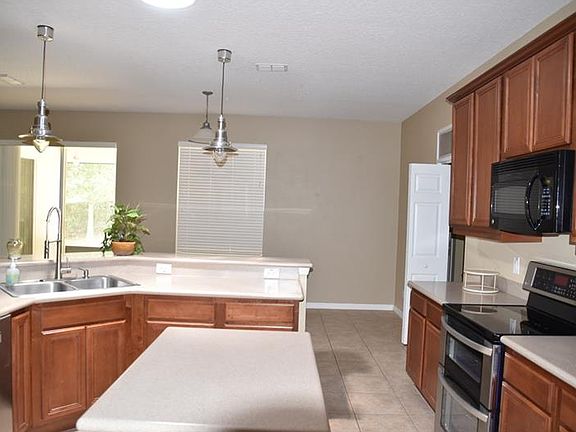 5th image of 5638 Windsong Oak Dr