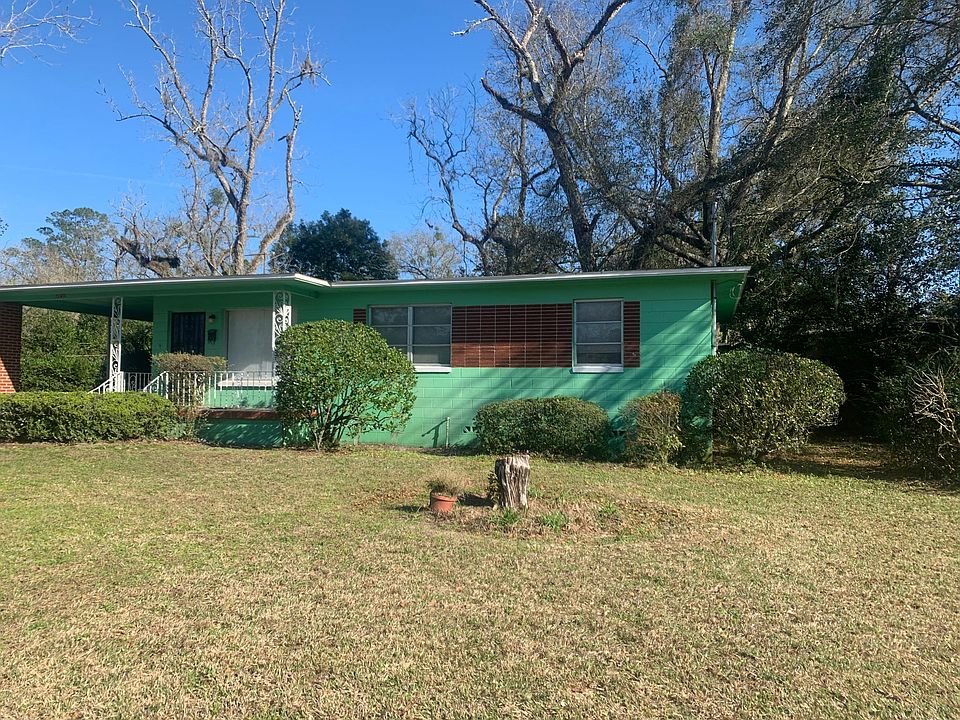 Exterior Front with carport