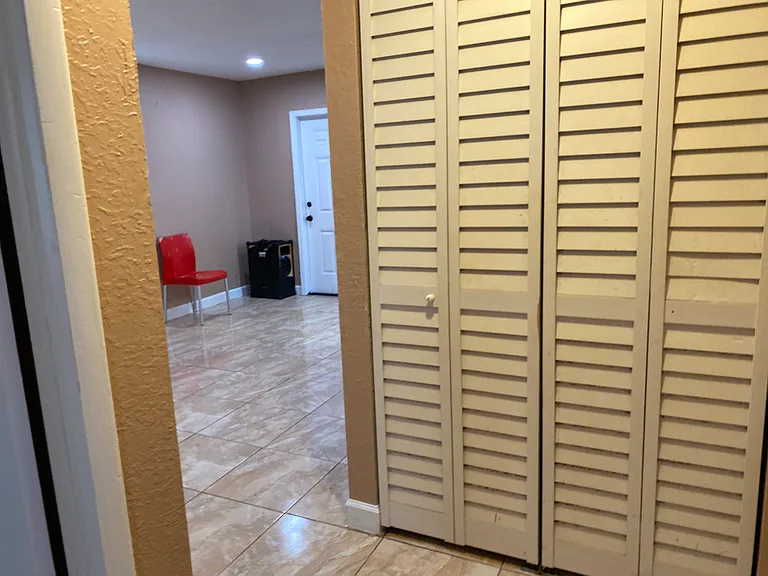 Hallway pointing towards living room