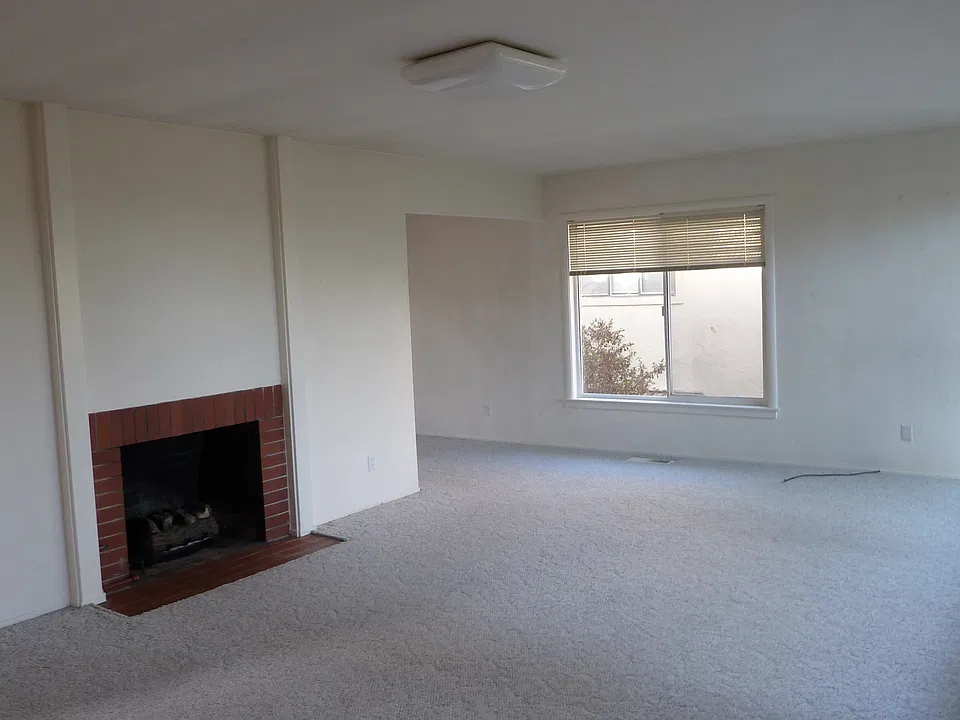Living Room with Gas Fireplace (Den around the Corner)
