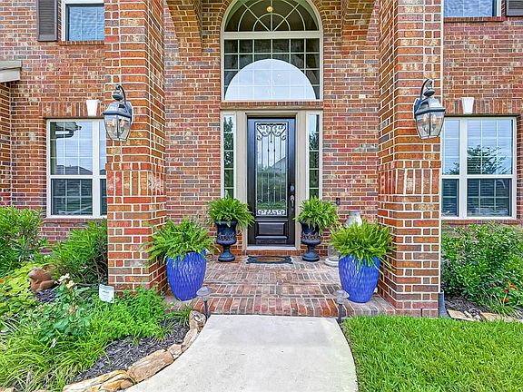 Lush and welcoming entry.