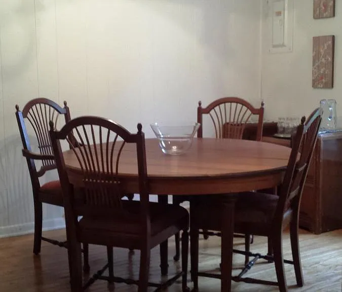 Big, antique wood kitchen table and chairs