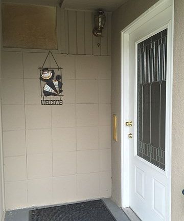 Highly upgraded front door with beveled glass