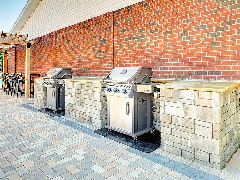 Grill and chill on our patio with built-in grilling stations and bar seating just steps from the pool.