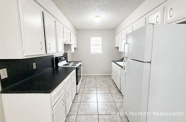 7303 Avenue X #103 — Photo 7