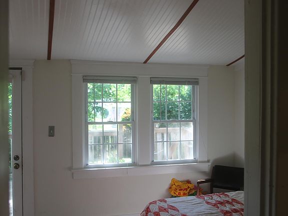 Smallest third bedroom looks out on the deck and the back yard. Can also make for a great office.