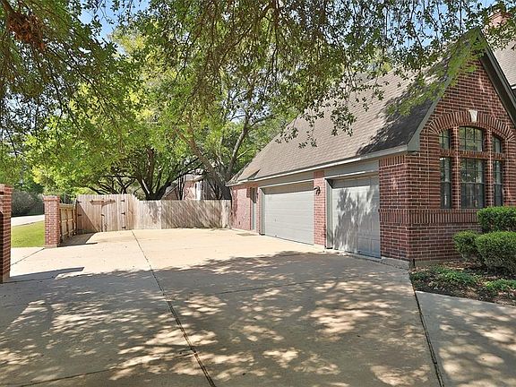 Oversized 3 car garage with second driveway. No parking issues here for large family or parties!