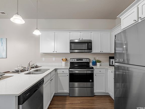 Kitchen, with stainless steel appliances.