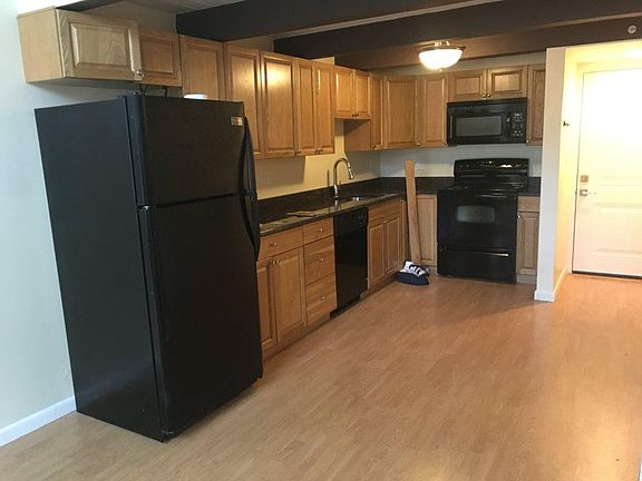 Full kitchen with dishwasher and garbage disposer.