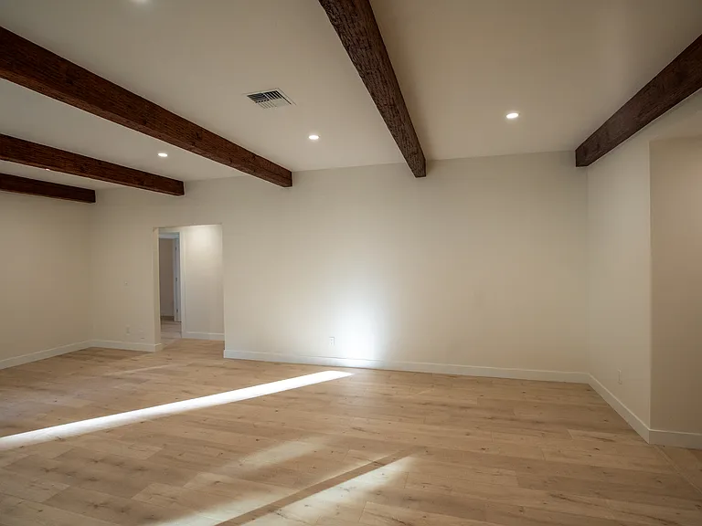 Left doors lead to two bedrooms and bathroom. Right takes you to primary bedroom, pantry and laundry/bathroom.