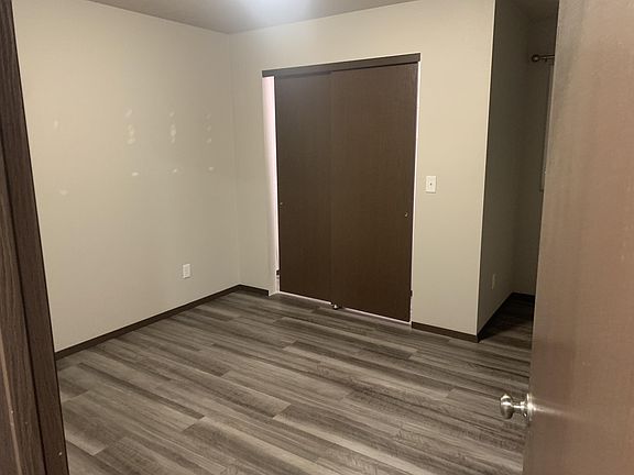 Each closet has lights and shelves