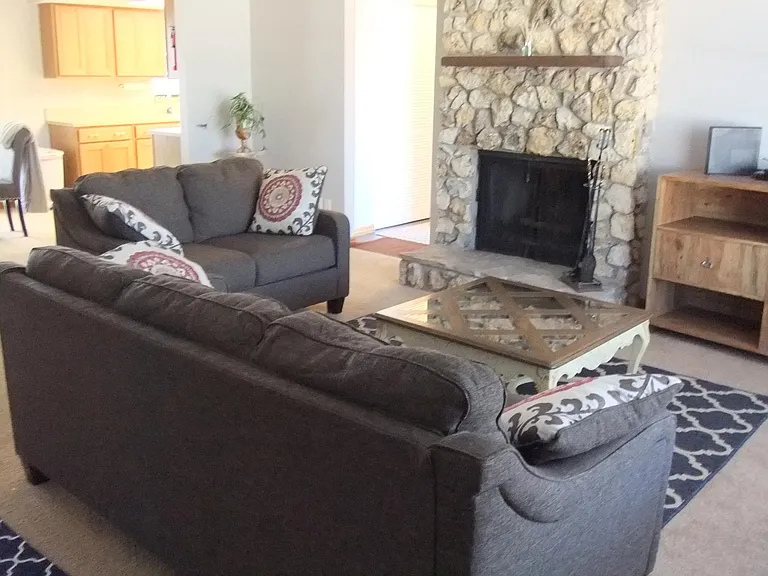 Living room with 52" smart tv.