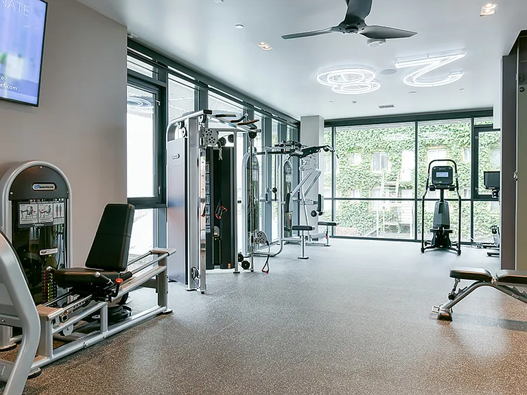 Weight stations at the club-quality fitness center