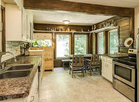 Updated kitchen with stainless appliances. Eat in area overlooking backyard. Enjoy the deer walking 