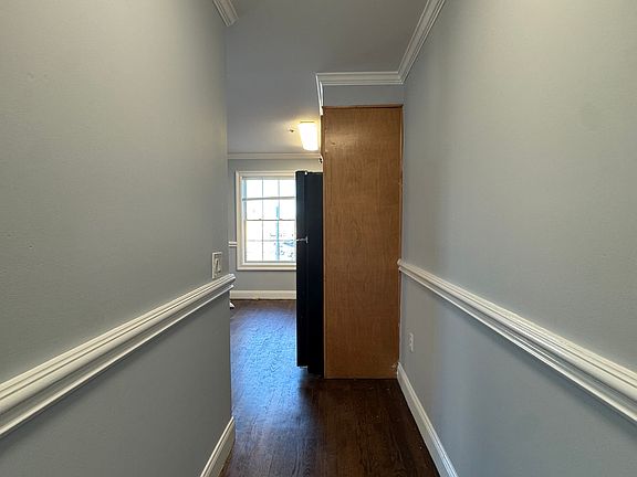 Entrance hall leading to open kitchen/living room