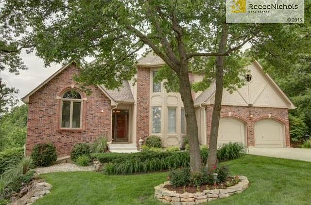 Brick trim and beautiful landscaping