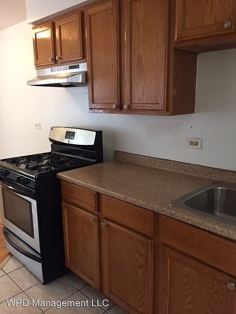 1st image of 7848 S Coles Ave APT 2A