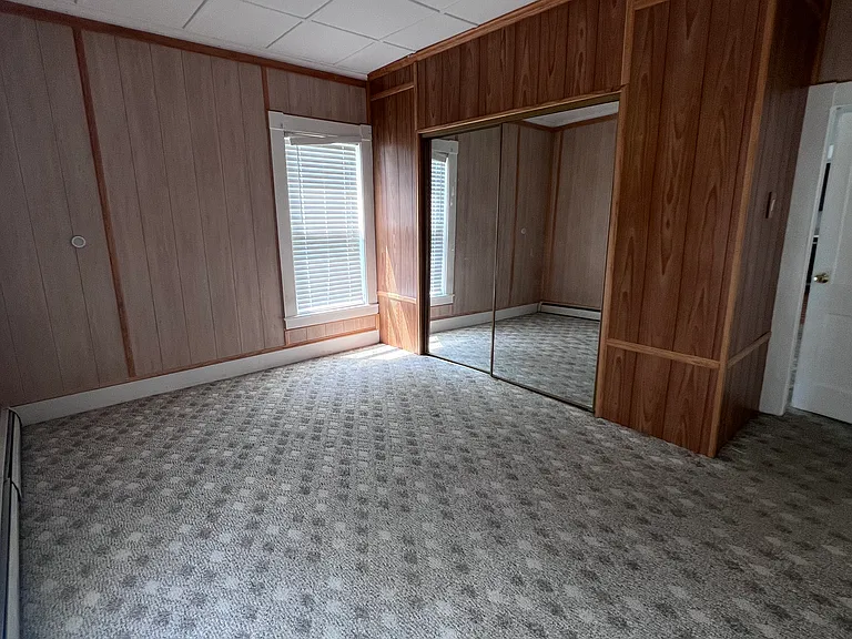 Bedroom, closet with full-length, sliding doors
