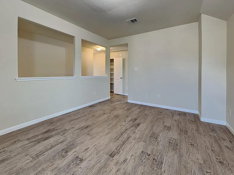 Spacious, neutral-toned room w