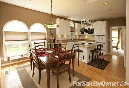 Kitchen and Informal Dining Area
						:
						Remodeled kitchen with granite countertops