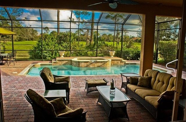 Relax by the pool and enjoy the golf views