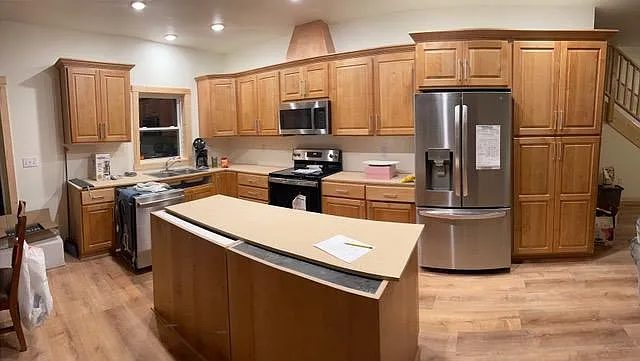 Older photo during final house building. Kitchen was still in process.
