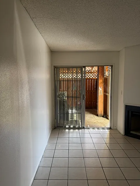 DOOR TO PATIO FROM LIVING ROOM - 11951 Vanowen St #D