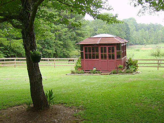 Enjoy the hot tub from the cabana overlooking  the pasture.