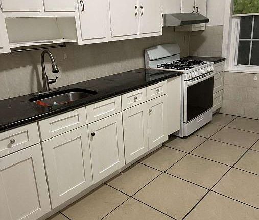 Kitchen space after walking through the living room.