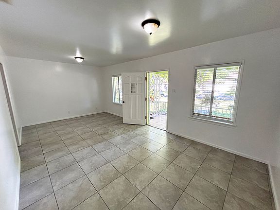 Front entrance and large Living Room with Dining Area