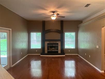 Living Room with Wood Burning Fireplace