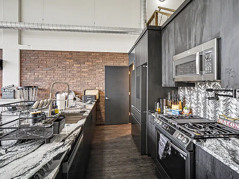 Kitchen comes with high end, smart appliances, gas range, and an espresso machine grinding whole beans for a perfect coffee or capuchin. Utensils, silverware, plates, pots including CutCo knives will be provided.